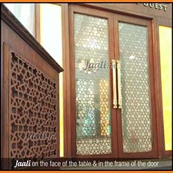 Jaali on the face of the table & in the frame of the door copy